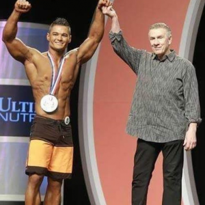 my first ever Olympia being awarded by President Manion - Jeremy Buendia Fitness